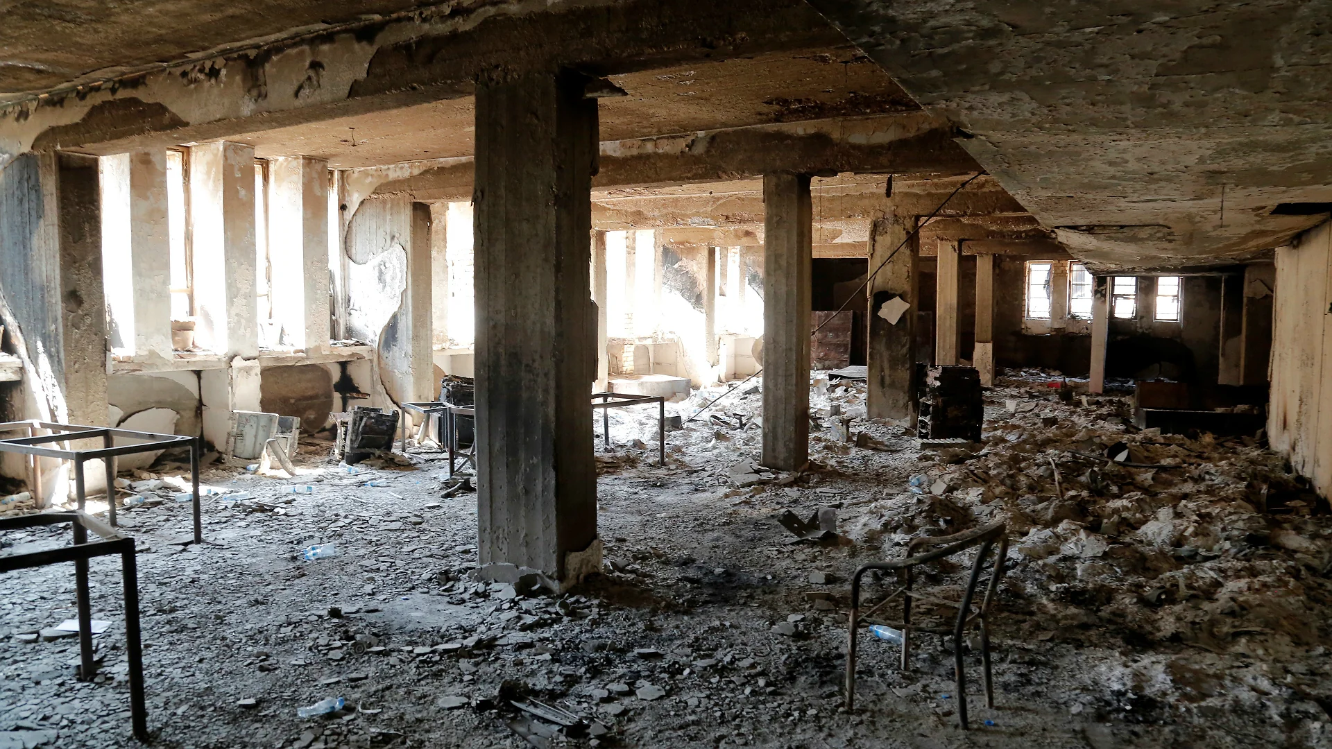 Mending scars through heritage: Geologist who fought IS helps save Mosul's antiquities